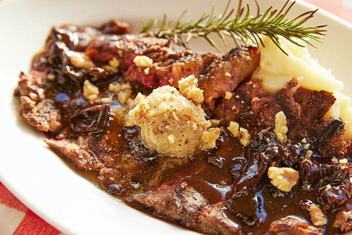 U.S. Rib-Eye Steak w/prune sauce & honey walnuts